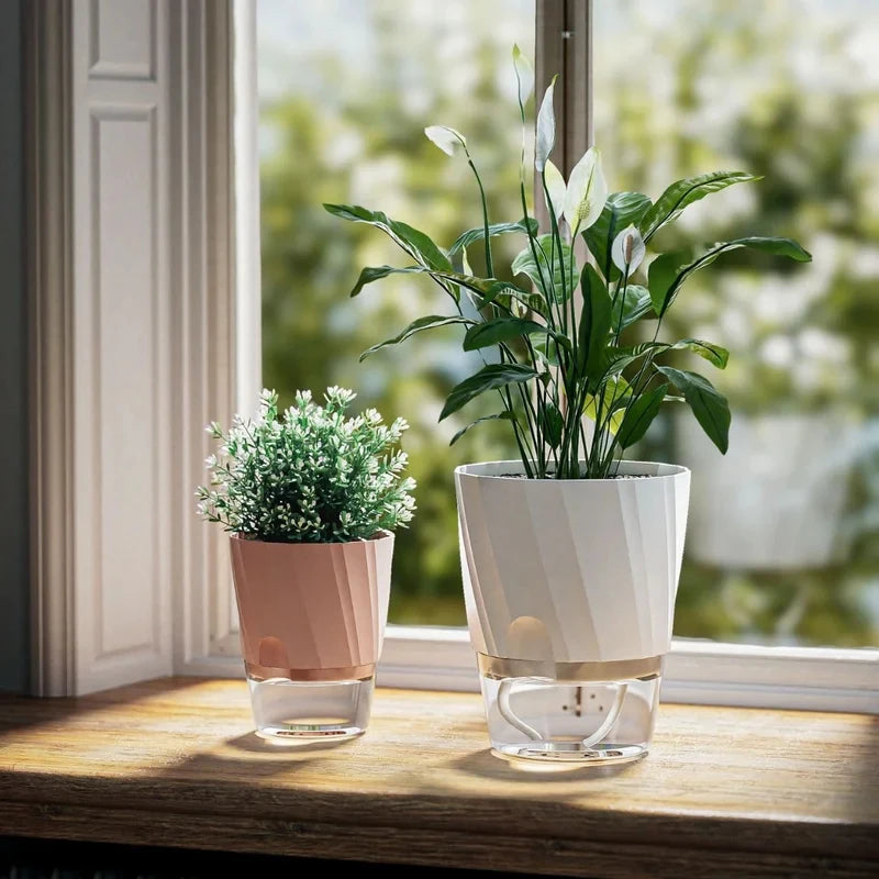 Pot auto-arrosant double paroi